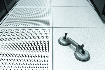 raised floor and suction tools in datacenter