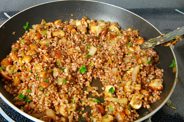 Fried mushrooms in a frying pan