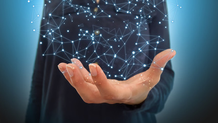 Businesswoman on blurred background holding hand flying huge network connection