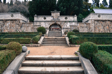 One of the decorations of the park estate is in the Late Modern style staircase with wide steps and a bench in the grotto.