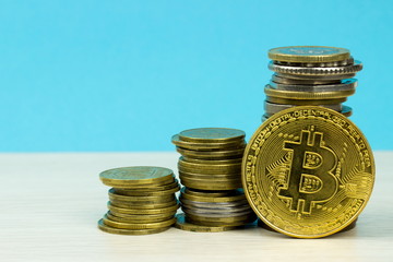 Cryptocurrency Bitoin and coins towers. Empty space for text. Blockchain technology. Virtual Digital money