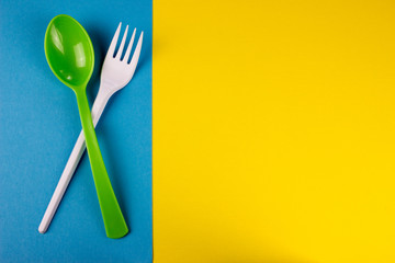 Fork and spoon. Fast food concept. Color background, empty space for text and design