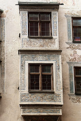 Wasserburg am Inn, Upper Bavaria, Germany - detail of Ganserhaus facade, building dated 1555 in the medieval old town, with painted decorations around the jutted windows