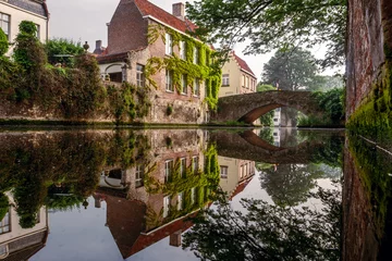 Papier peint photo Bruges Brugge streets with canals in the early morning  © MKavalenkau