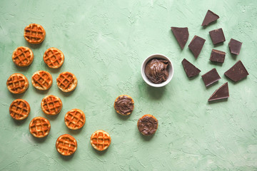 Belgian waffles and chocolate, coffee and hot pepper. From top view