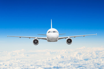 Airplane in the sky above the clouds flight journey sun height
