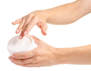 White jar of cream for a body in hands on a white background isolation