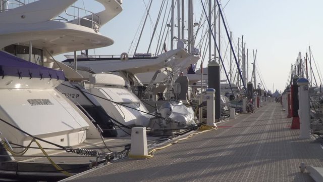 View over a jetty with many boats and facilities in the marina of La Grande Motte, France, Mediterranean