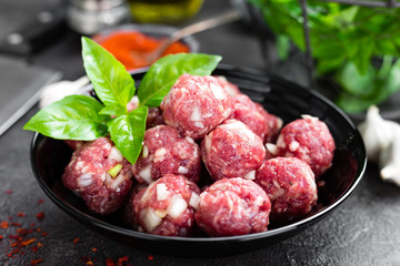 Beef meatballs. Cooking raw beef meatballs