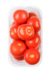 Plastic tray with fresh organic raw tomatoes