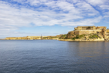 Mediterranean view of part of Bighi Hospital and Fort Ricasoli in the distance, Malta