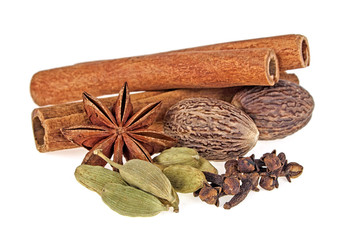 Anise, cardamom, cloves, nutmeg and cinnamon sticks on a white background. Spices.