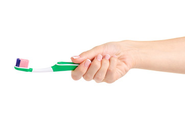 Toothbrush in hand on white background isolation