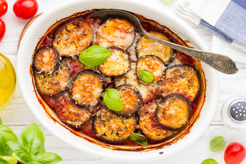 Eggplant casserole with tomato sauce, white cheese, tasty summer stew