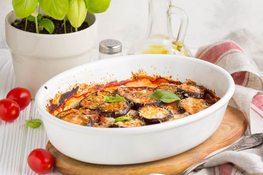Eggplant casserole with tomato sauce, white cheese, tasty summer stew
