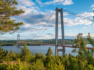 The "Högakustenbron" or high coast bridge in north of Sweden just outside Härnösand or Harnosand is one of the longest suspension bridges in Scandinavia.