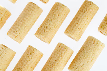 Wafer rolls. Gtoup of tasty crispy tube wafer on white background. Dessert