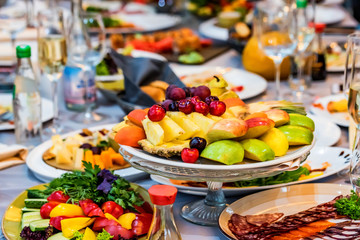 Beautiful fruit plate on festive table