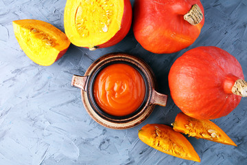 Pumpkin soup with fresh autumn hokkaido pumpkins - obrazy, fototapety, plakaty