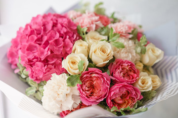 flower arrangement with hydrangea. beautiful summer bouquet. Color light pink. The concept of a flower shop.