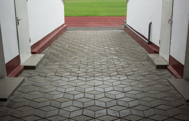 sport building object concept of enter to football field stadium with symmetry concrete poor empty hall way  