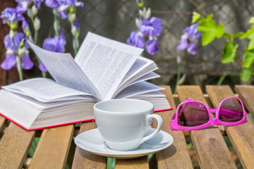 Relax with a book in the summer garden