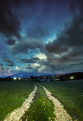 Fototapeta na wymiar Night sky and road