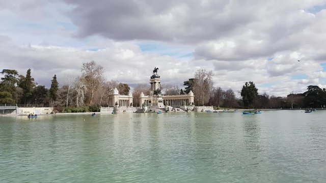Wonderful lake with paddle boats at Retiro Park in Madrid