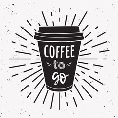 Vector illustration of a take away coffee cup with phrase "Coffee to go" and vintage light rays. Drawing for drink and beverage menu or cafe design.