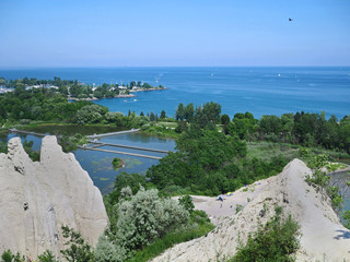view from edge of the cliff at Scarborough Bluffs to park and lake below, Toronto
