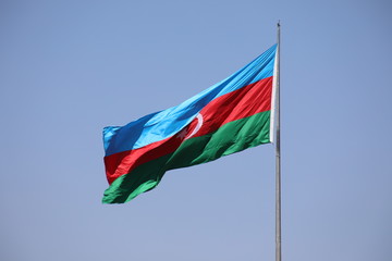 Azerbaijan national flag with Crescent moon. Flags waving wind