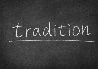Fototapeta premium tradition concept word on a blackboard background