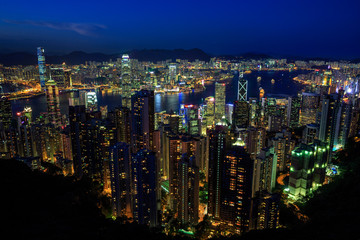 Hong Kong City Skyline at night time, photo taken from a nearby mountain (Victoria Peak) overlooking the city