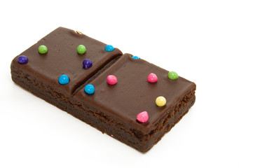 Chocolate Brownies with Candies on White Background