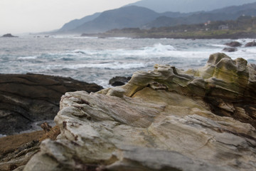 Fototapeta na wymiar Sandstone Macro Image, Soft Blurred Background, Seaside Ocean