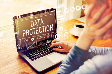 Data protection with man using a laptop computer