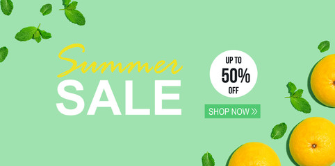 Summer sale message with halved fresh grapefruits