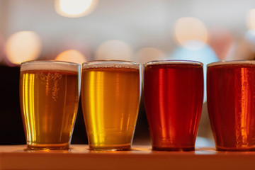 Closeup of beer flight in tasting glasses