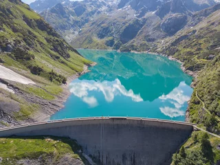 Kunstfelldecke mit Muster Damm Aerial view of the dam of the Lake Barbellino, an Alpine artificial lake. Italian Alps. Italy