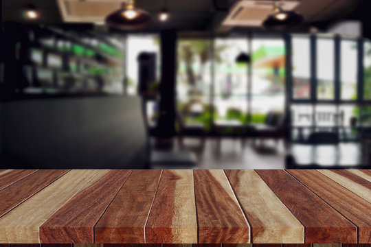 wood table top in coffee shop blank for design