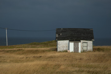 House with a dark grey sky