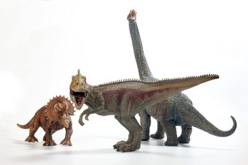 Tyrannosaurus Triceratops Brachiosaurus Dinosaur Toy figurine on white background
