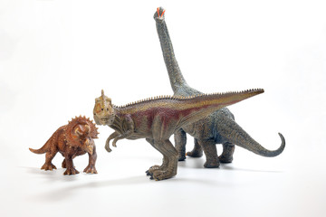 Tyrannosaurus Triceratops Brachiosaurus Dinosaur Toy figurine on white background