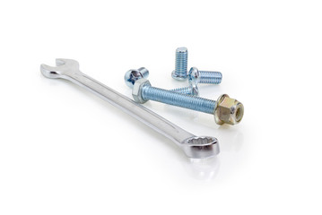 Combination wrench, bolt and nut, screws on a white background