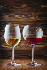 Couple glasses with red and white wine for tasting