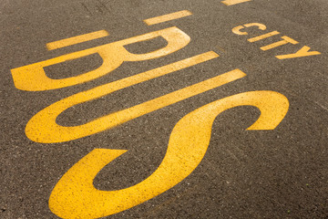 yellow city bus fast lane