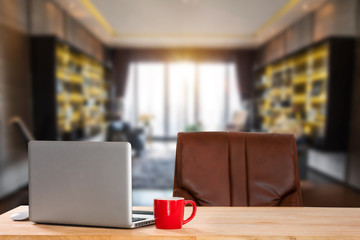 workspace with computer, office supplies, and coffee cup at office. desk work concept. in morning light
