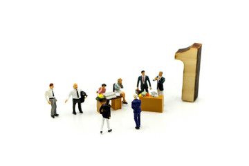 Miniature people : business people group have meeting and working in  office