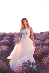 Beautiful bride in wedding day in lavender field