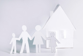 home and men made of paper.the concept of a mortgage.